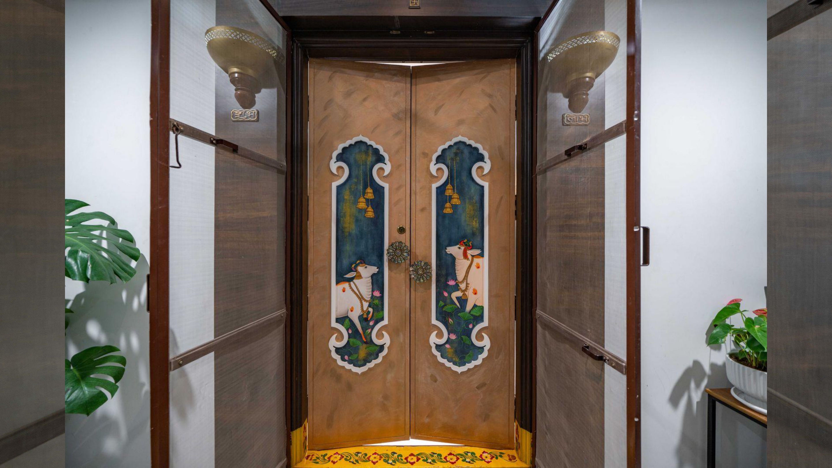 Panchabootha — hand-painted traditional door detail
