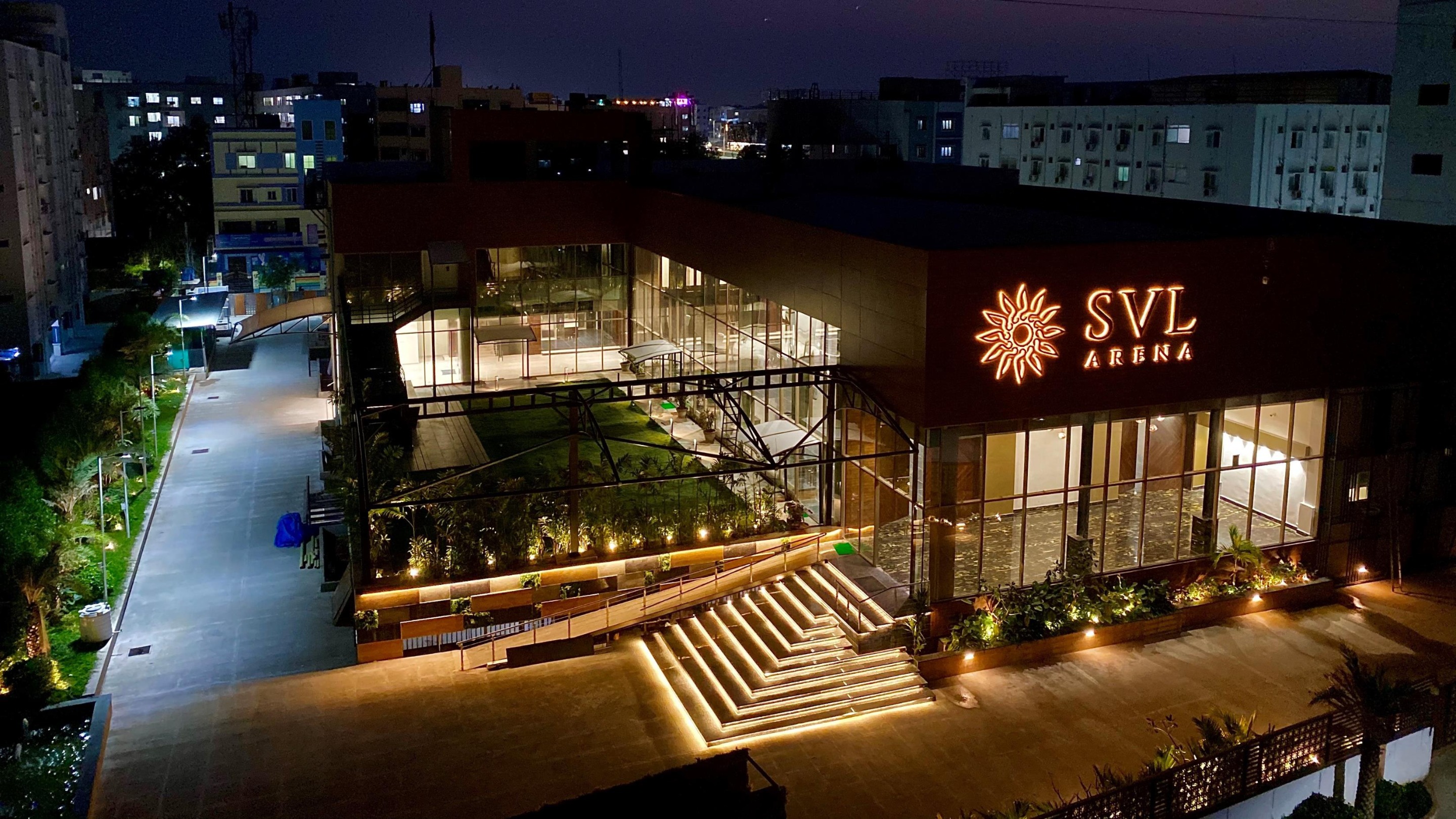SVL Arena — illuminated convention center at night showing the venue's scale and presence